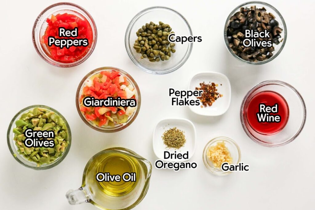 Ingredients needed to make the Muffuletta Olive Salad recipe with text labels.