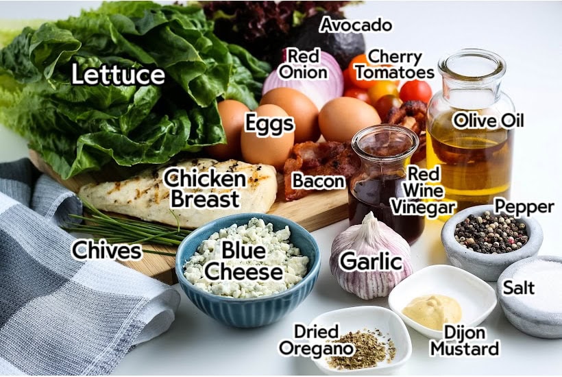 Ingredients to make the Chicken Cobb Salad and dressing with text labels.