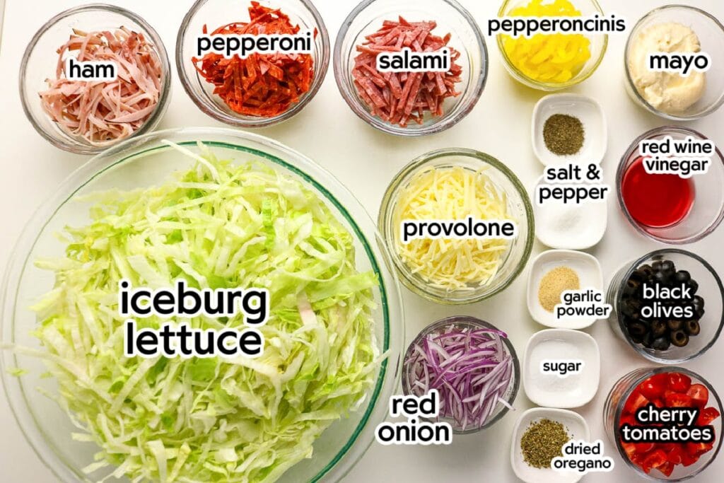 Ingredients needed to make the Italian Grinder Salad recipe with text labels. 